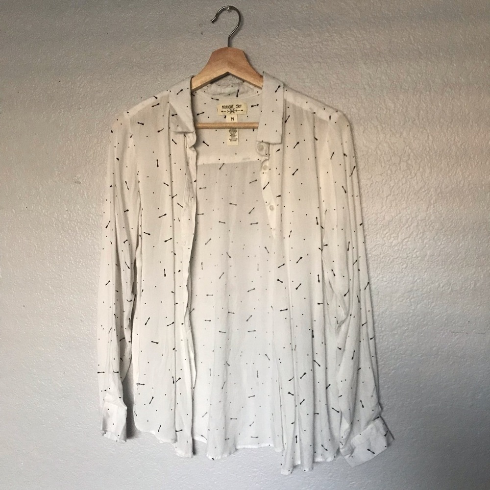 White blouse with arrows